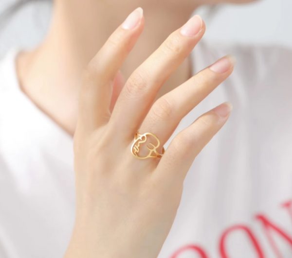 Bague Femme Visage Abstrait Acier Doré